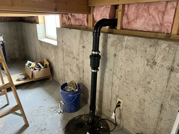 Sump discharge routed outside, away from the valve